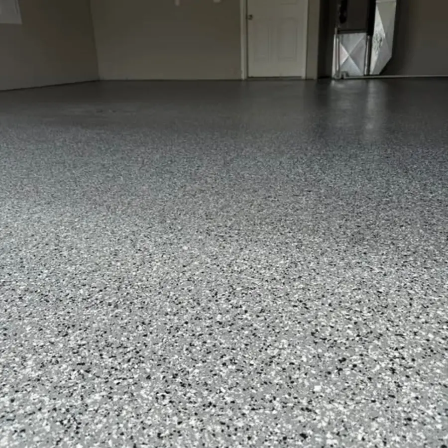 Black and white large flake epoxy garage floor Jefferson City