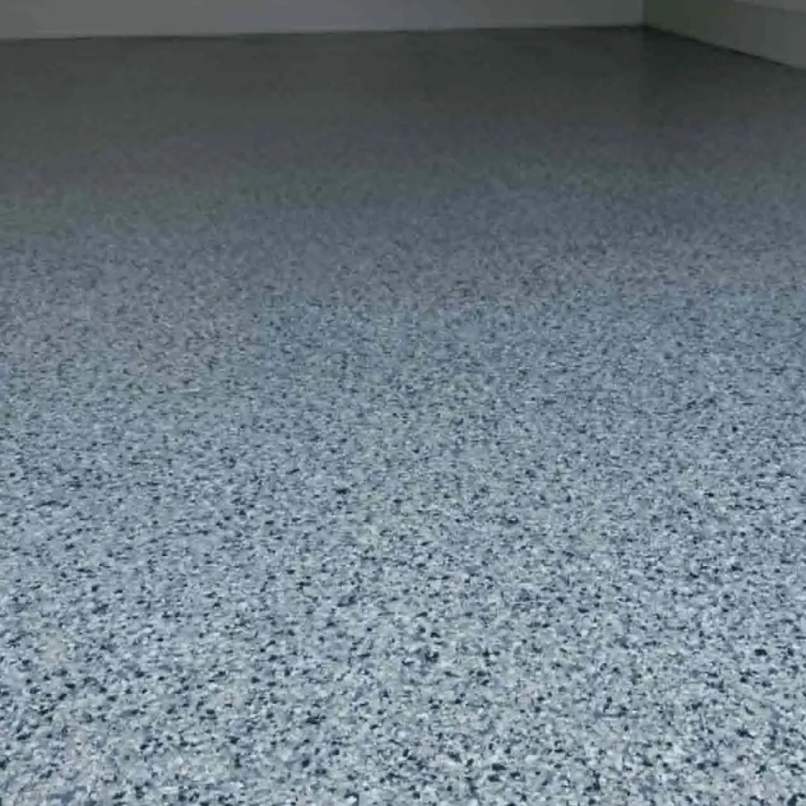 Light gray flake epoxy floor large open garage Missouri